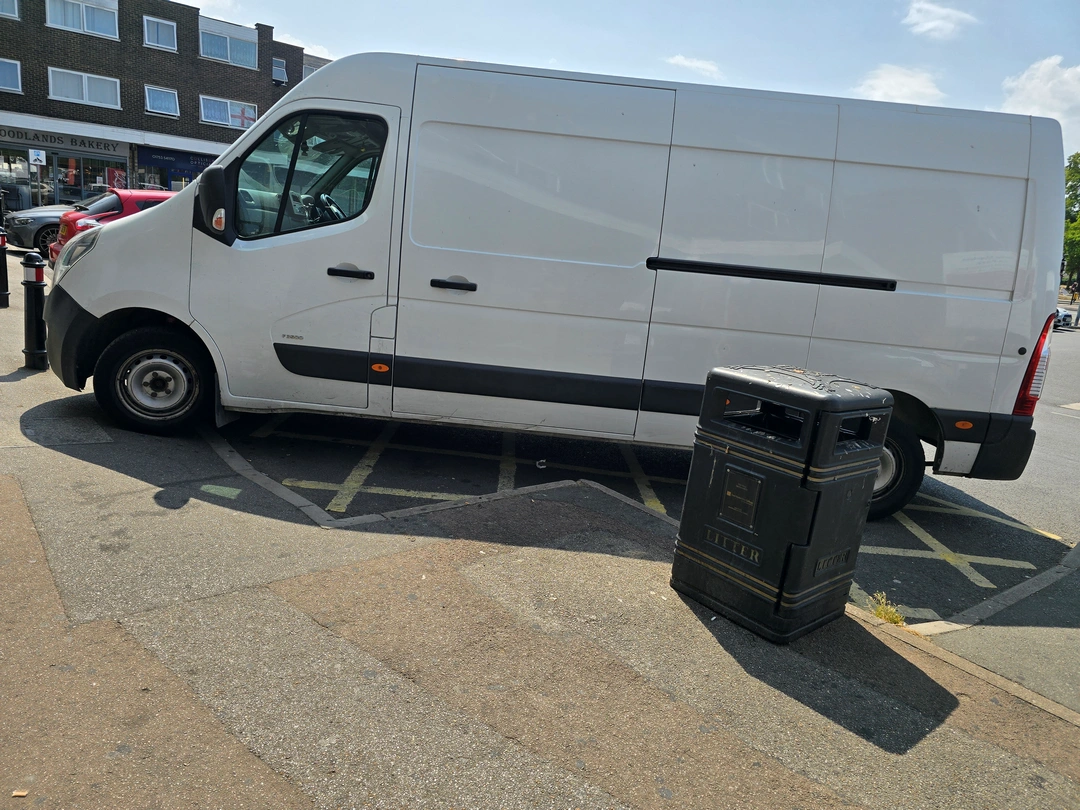 Diagonal hatched and disabled bay parking. Photo by Harry, Harrow Market, Langley Slough